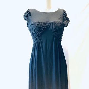 Draped dress.